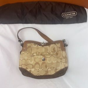 Small tan and brown signature coach bag
